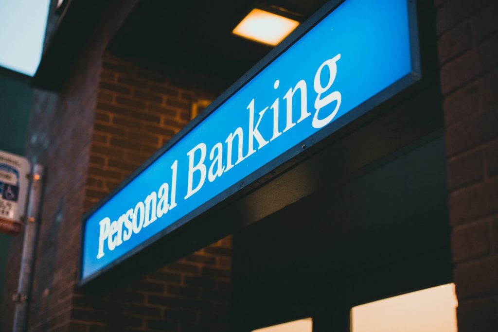 Blue and white personal banking signage