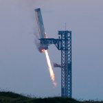 SpaceX's Super Heavy booster lands during SpaceX Starship's fifth flight test in Texas