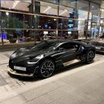 Meet the Bugatti Divo: Where Luxury Meets Power - matte black with subtle gold accents
